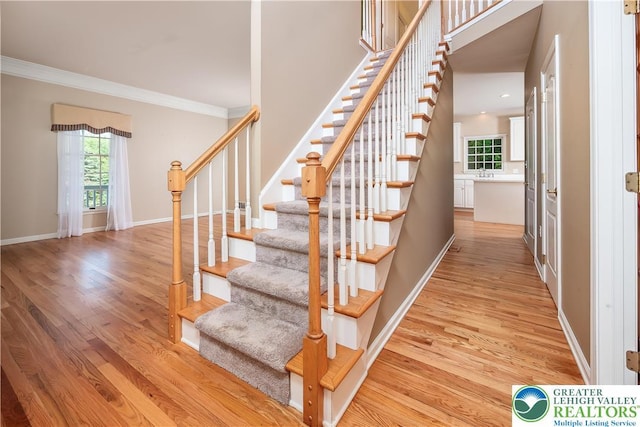 730 Buttermilk Rd, Williams Twp, PA 18055 - stairway with ornamental molding, wood finished floors, baseboards, and recessed lighting
