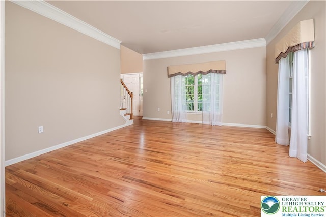 730 Buttermilk Rd, Williams Twp, PA 18055 - empty room featuring ornamental molding, stairway, light wood-type flooring, and baseboards