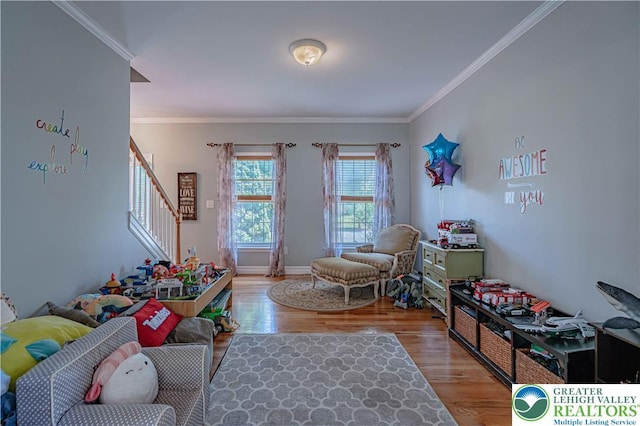 697 Ryan Dr, South Whitehall Twp, PA 18103 - living room with stairway, wood finished floors, and ornamental molding