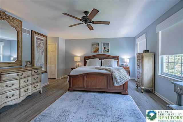697 Ryan Dr, South Whitehall Twp, PA 18103 - bedroom with wood finished floors, baseboards, and ceiling fan