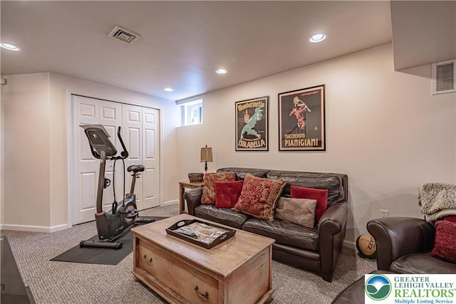 697 Ryan Dr, South Whitehall Twp, PA 18103 - living area featuring light colored carpet, baseboards, and recessed lighting