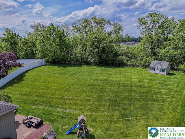 697 Ryan Dr, South Whitehall Twp, PA 18103 - view of green lawn featuring an outdoor structure