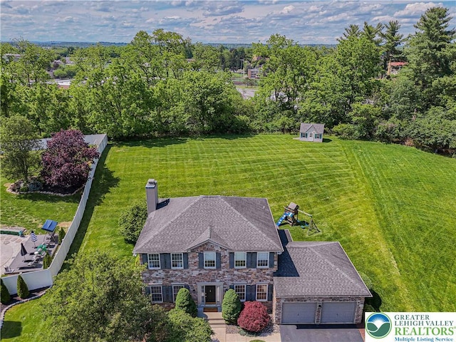 697 Ryan Dr, South Whitehall Twp, PA 18103 - view of subject property with a tree filled landscape