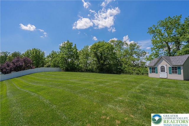 697 Ryan Dr, South Whitehall Twp, PA 18103 - view of yard featuring an outbuilding