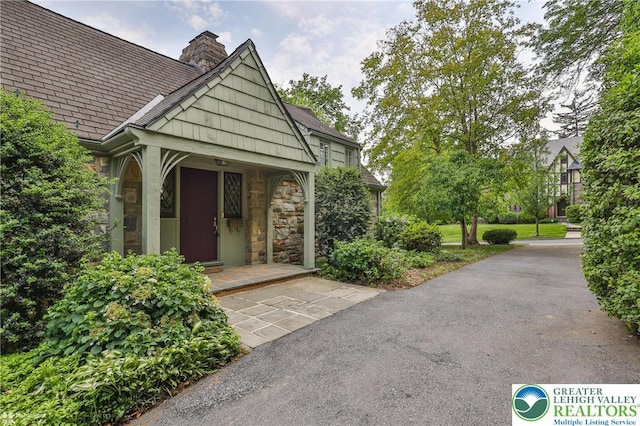 145 N Main St, Allentown City, PA 18104 - entrance to property with a chimney and stone siding