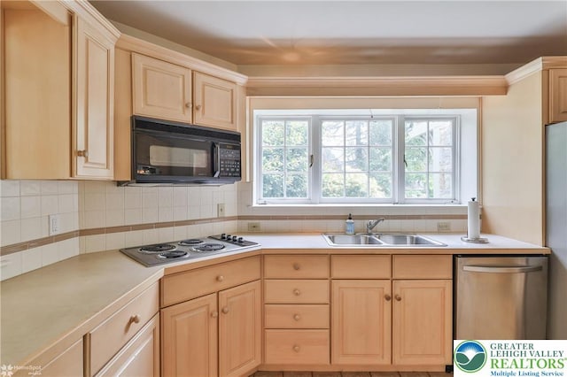145 N Main St, Allentown City, PA 18104 - kitchen featuring black microwave, light brown cabinetry, a sink, and stainless steel dishwasher
