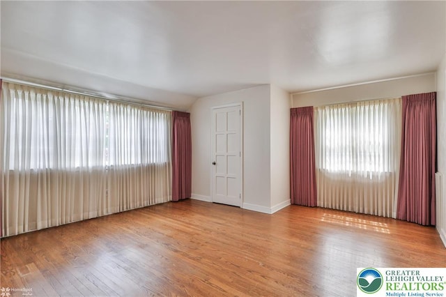 145 N Main St, Allentown City, PA 18104 - spare room with plenty of natural light, wood finished floors, and baseboards