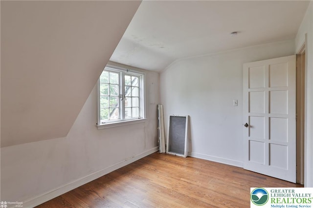 145 N Main St, Allentown City, PA 18104 - bonus room with vaulted ceiling, baseboards, and light wood finished floors