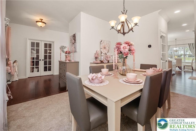 1043 Lisa Ln, Palmer Twp, PA 18045 - dining area featuring french doors, a chandelier, recessed lighting, wood finished floors, and carpet flooring