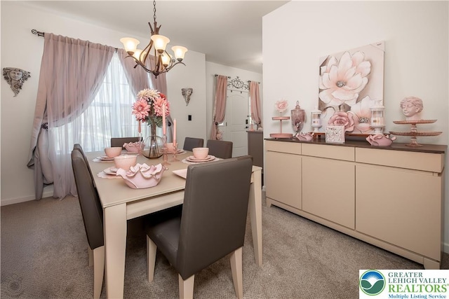 1043 Lisa Ln, Palmer Twp, PA 18045 - dining area featuring a chandelier and light colored carpet