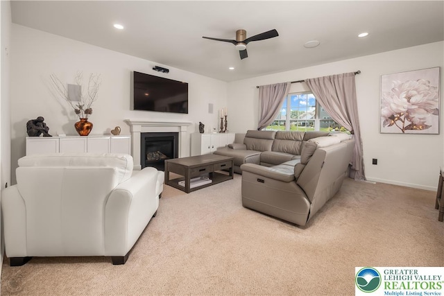 1043 Lisa Ln, Palmer Twp, PA 18045 - living room featuring ceiling fan, light carpet, recessed lighting, a glass covered fireplace, and baseboards