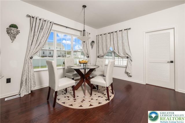 1043 Lisa Ln, Palmer Twp, PA 18045 - dining area with wood finished floors, baseboards, and plenty of natural light