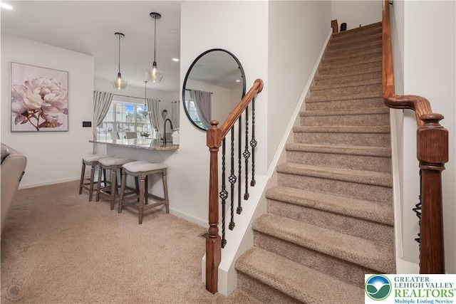 1043 Lisa Ln, Palmer Twp, PA 18045 - staircase with carpet flooring, baseboards, and recessed lighting