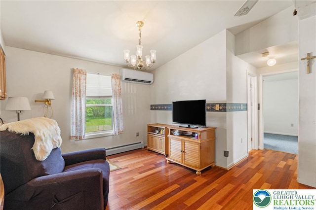 4 Davis St, Luzerne, PA 18706 - living area with a wall mounted AC, a baseboard radiator, a chandelier, light wood-style flooring, and vaulted ceiling