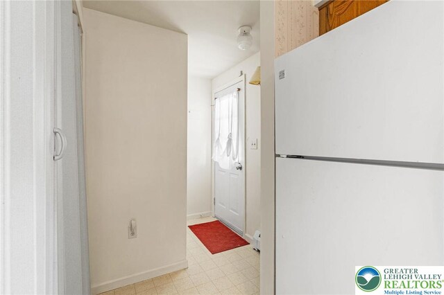 4 Davis St, Luzerne, PA 18706 - doorway featuring baseboards and light flooring