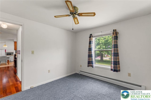 4 Davis St, Luzerne, PA 18706 - empty room with a baseboard radiator, ceiling fan, and baseboards