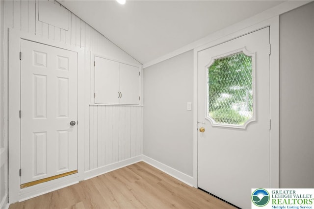 541 Elm St, Emmaus Borough, PA 18049 - doorway to outside featuring lofted ceiling, light wood-style flooring, and baseboards