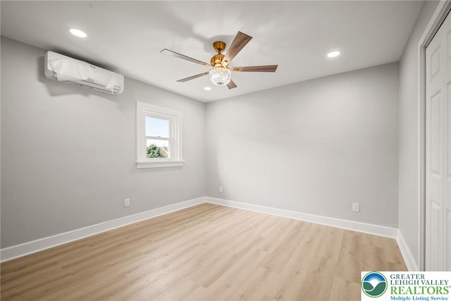 541 Elm St, Emmaus Borough, PA 18049 - unfurnished bedroom featuring a wall mounted air conditioner, light wood-type flooring, recessed lighting, baseboards, and a ceiling fan