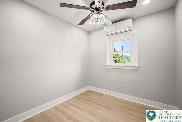 541 Elm St, Emmaus Borough, PA 18049 - unfurnished room featuring an AC wall unit, baseboards, ceiling fan, light wood-style floors, and recessed lighting