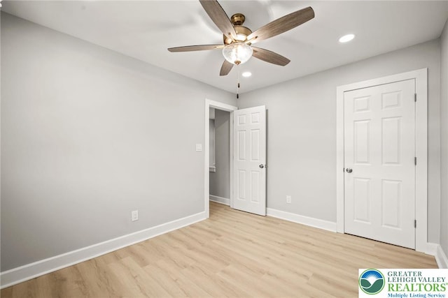 541 Elm St, Emmaus Borough, PA 18049 - unfurnished bedroom with light wood finished floors, baseboards, recessed lighting, and a ceiling fan