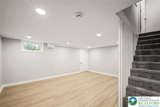 541 Elm St, Emmaus Borough, PA 18049 - below grade area with light wood finished floors, recessed lighting, stairway, and baseboards