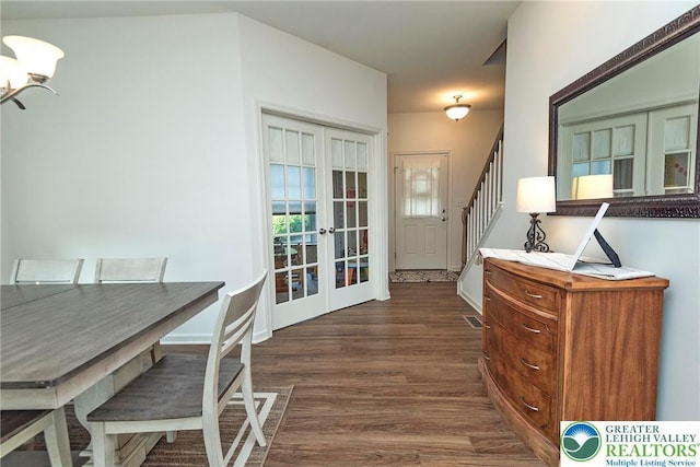 1404 Waverly Ave, Easton, PA 18040 - dining room with french doors, a chandelier, dark wood finished floors, and stairs