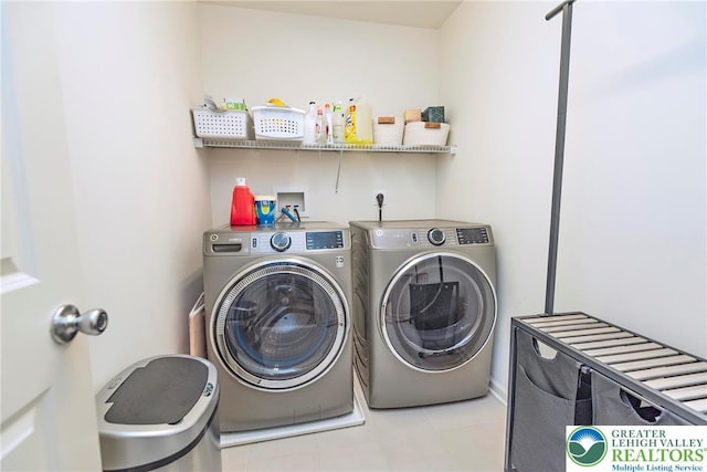 1404 Waverly Ave, Easton, PA 18040 - washroom with washing machine and clothes dryer and light tile patterned floors