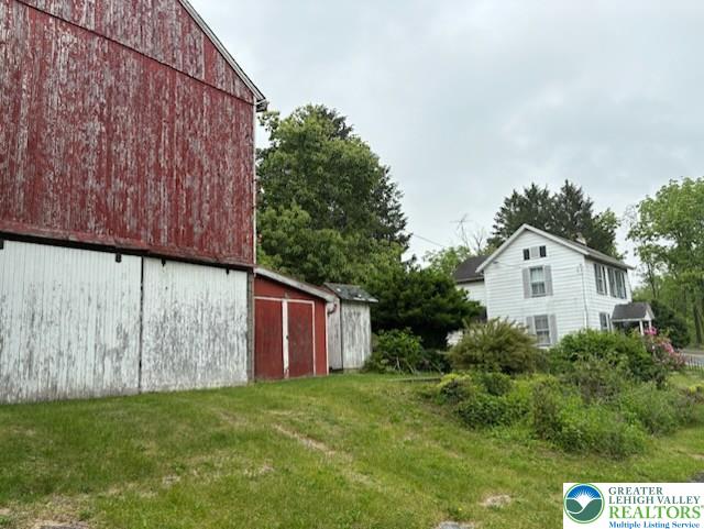 2530 5th Street, St, PA 18014 - view of grassy yard with a barn and an outdoor structure