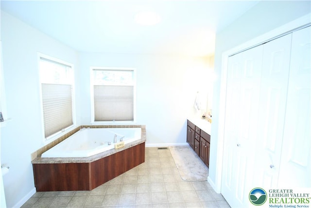 472 Bauer Rd, Moore Twp, PA 18014 - full bathroom with a jetted tub, baseboards, and vanity