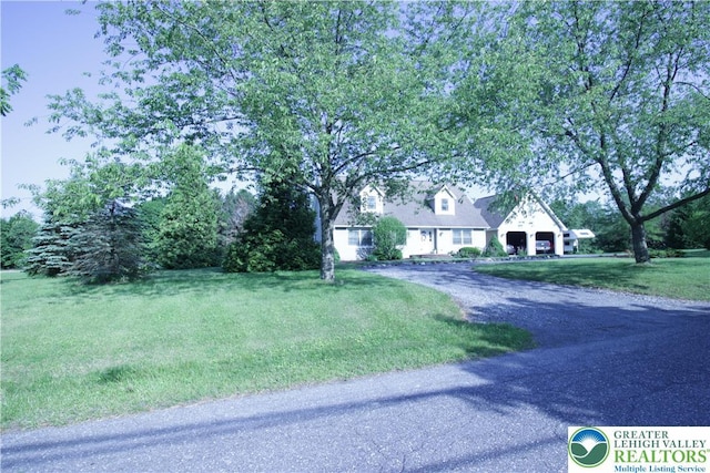 472 Bauer Rd, Moore Twp, PA 18014 - view of front of house with asphalt driveway and a front lawn