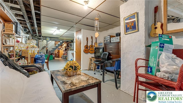718 Jordan St, Allentown City, PA 18102 - finished basement with stairway and a drop ceiling