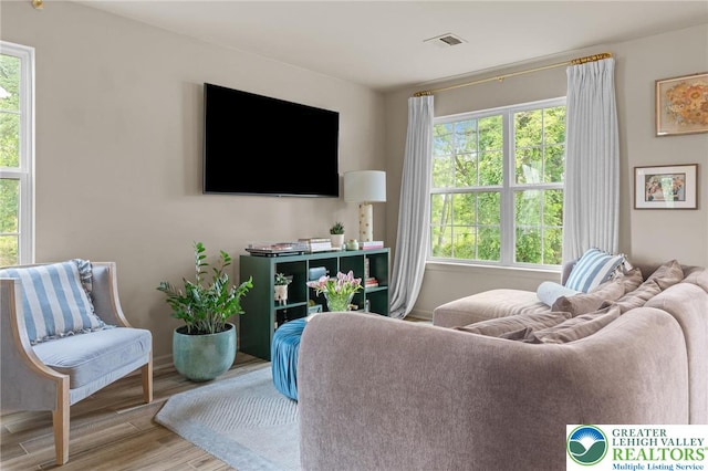 707 Blue Heron Dr, Allentown City, PA 18103 - living area featuring plenty of natural light and wood finished floors