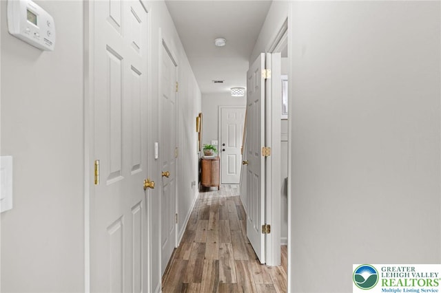 707 Blue Heron Dr, Allentown City, PA 18103 - corridor with wood finished floors