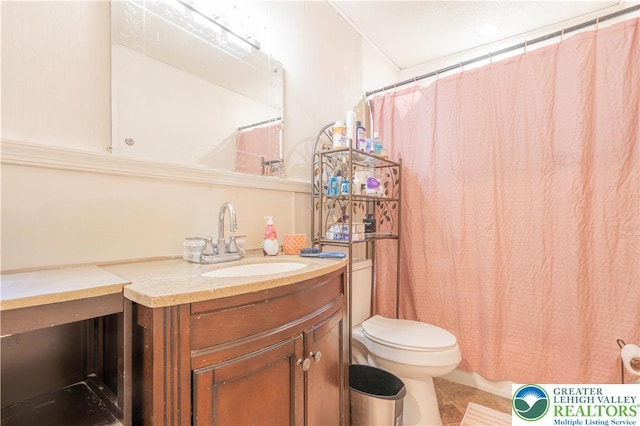 402 Bradford St, Allentown City, PA 18109 - bathroom with toilet, vanity, tile patterned flooring, and a shower with shower curtain