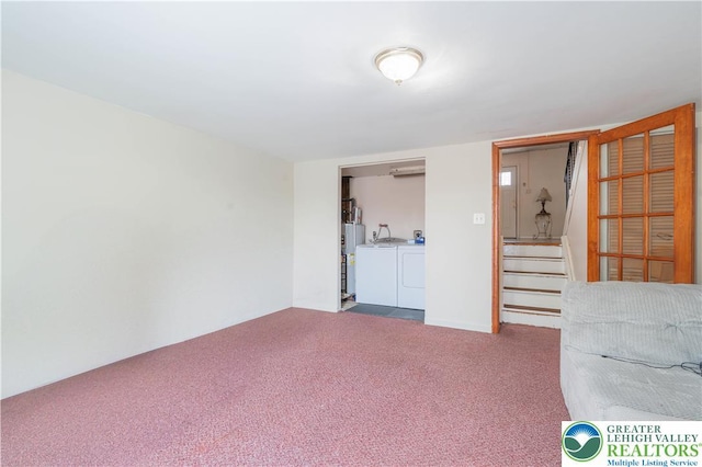 402 Bradford St, Allentown City, PA 18109 - carpeted empty room featuring washing machine and clothes dryer and stairs