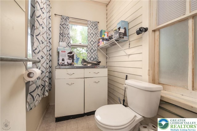 531 E Church St, Slatington Borough, PA 18080 - bathroom with toilet, baseboards, and tile patterned flooring
