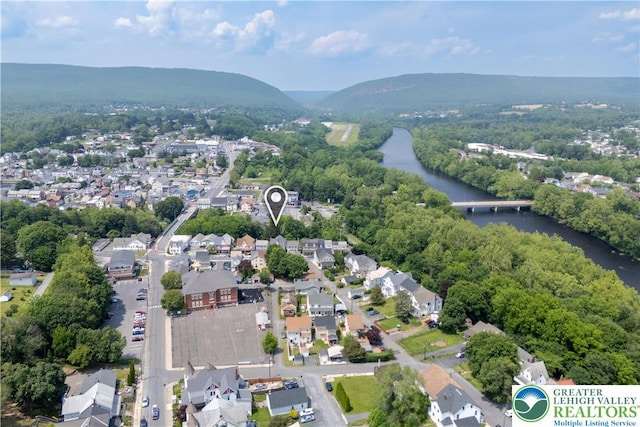 531 E Church St, Slatington Borough, PA 18080 - aerial overview of property's location with a water and mountain view, a notable bridge, and nearby suburban area