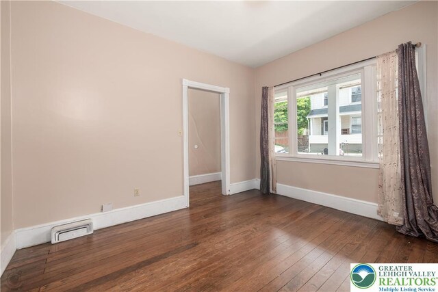531 E Church St, Slatington Borough, PA 18080 - empty room featuring dark wood-type flooring and baseboards