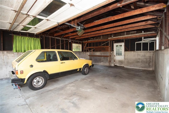 665 Furnace St, Emmaus Borough, PA 18049 - garage featuring a garage door opener