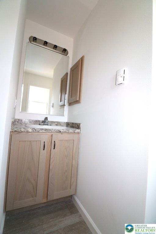 1025 W Princeton Ave, Palmerton Boro, PA 18071 - bathroom with vanity and baseboards