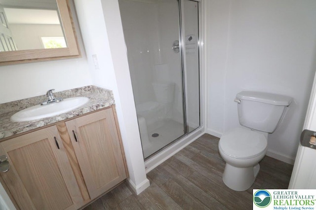 1025 W Princeton Ave, Palmerton Boro, PA 18071 - full bathroom featuring wood finished floors, vanity, and a stall shower