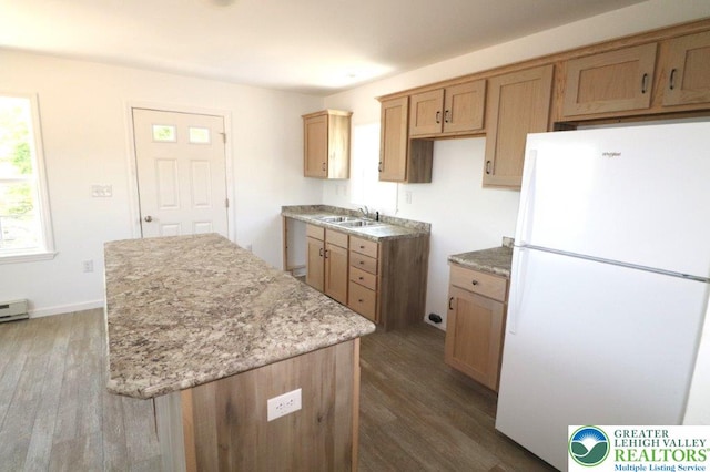 1025 W Princeton Ave, Palmerton Boro, PA 18071 - kitchen featuring freestanding refrigerator, a sink, dark wood-type flooring, and a center island