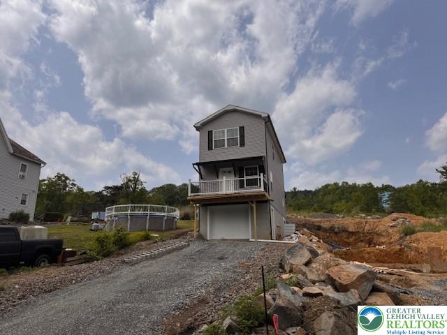 1025 W Princeton Ave, Palmerton Boro, PA 18071 - view of front facade featuring driveway and a garage