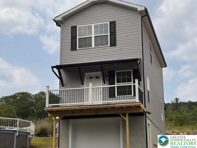 1025 W Princeton Ave, Palmerton Boro, PA 18071 - view of front facade featuring a garage