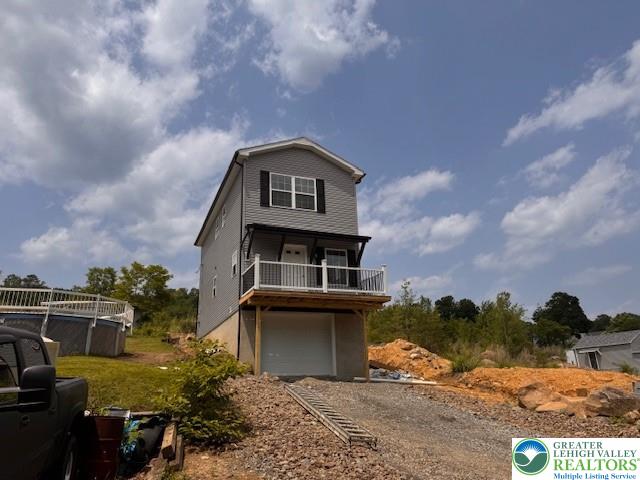 1025 W Princeton Ave, Palmerton Boro, PA 18071 - view of front of home featuring driveway and a garage
