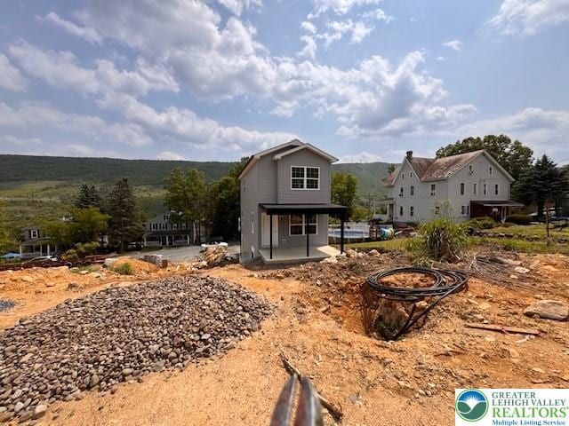 1025 W Princeton Ave, Palmerton Boro, PA 18071 - rear view of property featuring a fire pit and a patio area