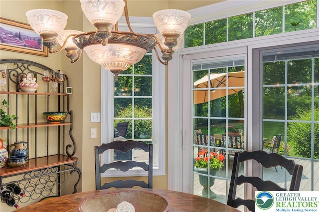 6335 Sweetbriar Ln, Upper Milford Twp, PA 18092 - dining space featuring a chandelier