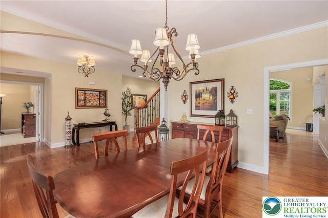 6335 Sweetbriar Ln, Upper Milford Twp, PA 18092 - dining room with a chandelier, wood finished floors, ornamental molding, and stairs