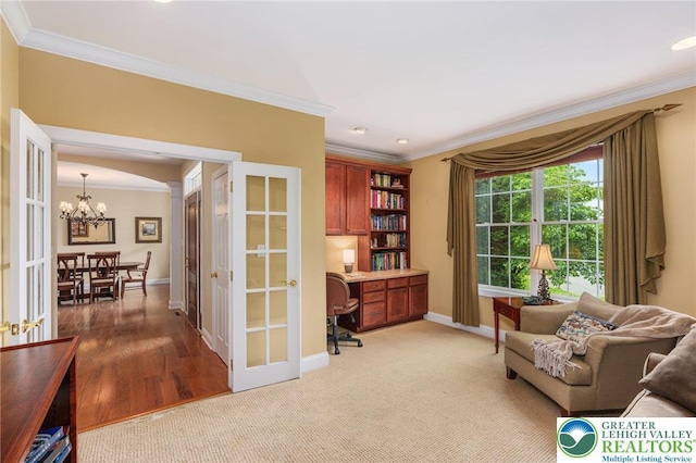 6335 Sweetbriar Ln, Upper Milford Twp, PA 18092 - home office with a chandelier, ornamental molding, french doors, and light carpet