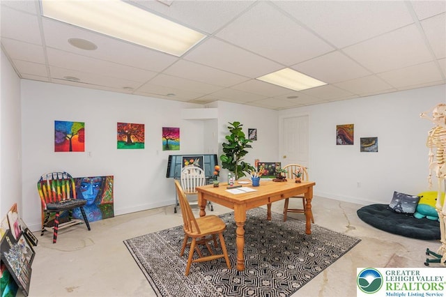 6335 Sweetbriar Ln, Upper Milford Twp, PA 18092 - dining area with a paneled ceiling, concrete flooring, and a desk